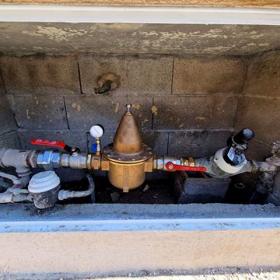 Réduteur de pression neuf dans la copropriété